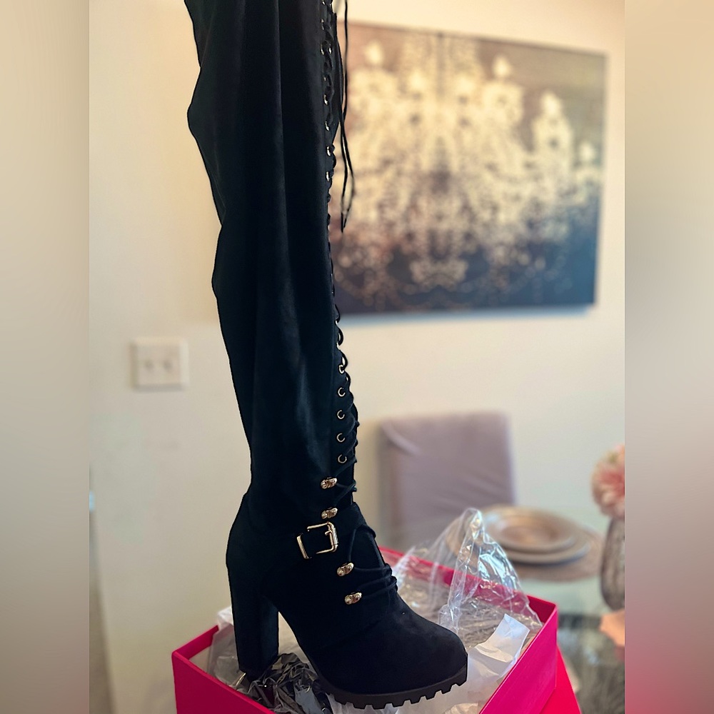 Black thigh high boots